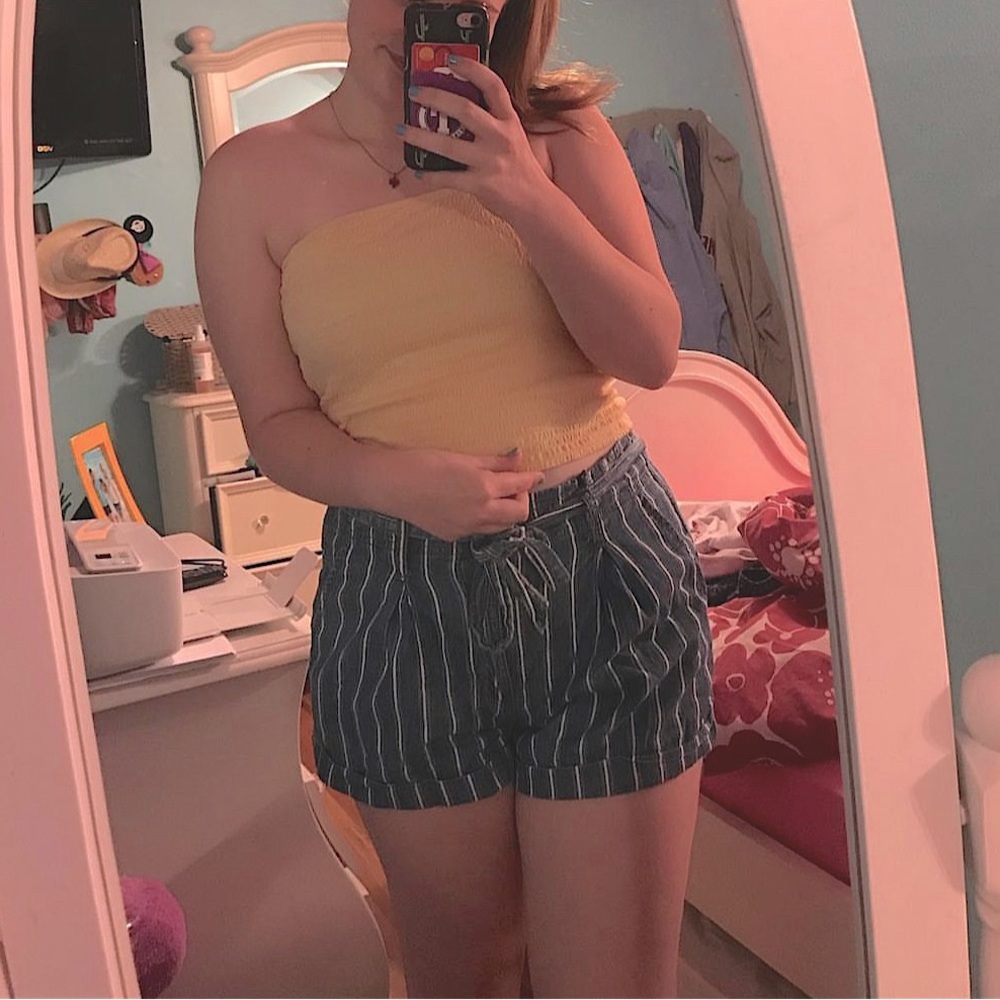 Blue and white striped jean shorts with tie belt